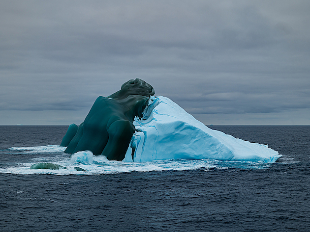 A floating flipped iceberg in the Weddell Sea, off Argentina, with a block of green sea ice now showing above the water, joined to the whiter land ice. This picture was taken from the British research vessel RRS Discovery on a research cruise in the Southern Ocean in the Weddell Sea. The Ocean Frontier Institute says the ocean is the main climate actor and needs this acknowledgment. Credit: David Menzel/Climate Visuals
